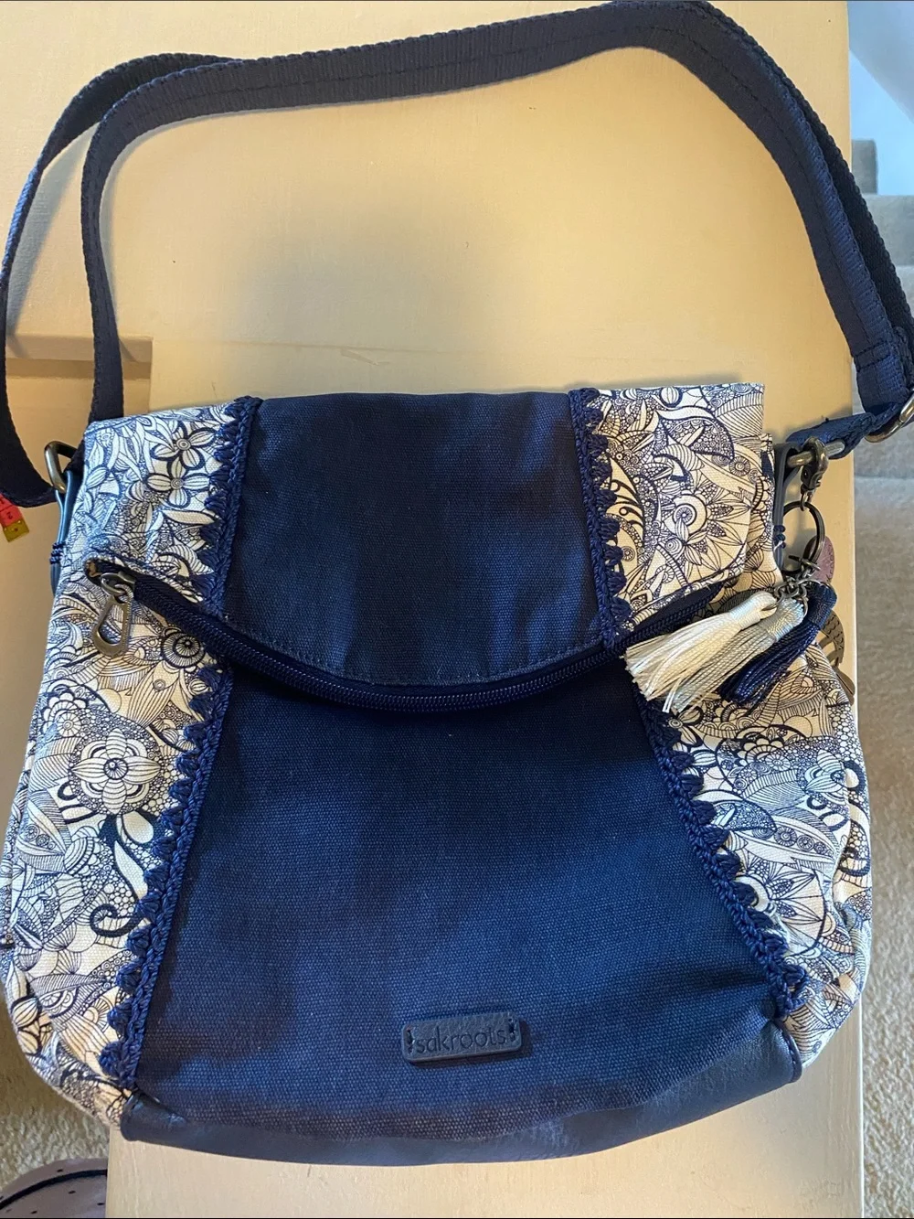 Sakroots Navy and White Floral Crossbody with Tassel Accent